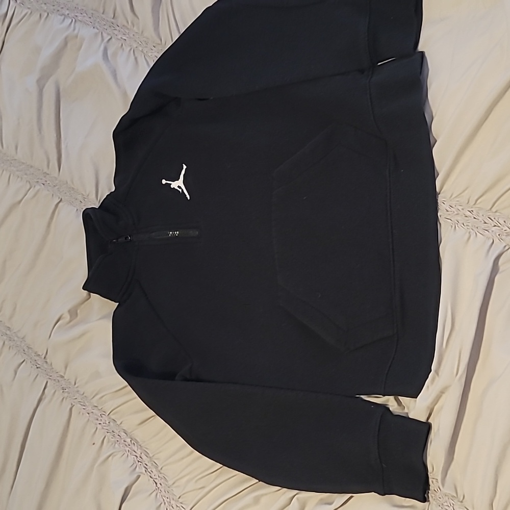 Boys Medium black Jordan half zip sweet shirt with front pocket.